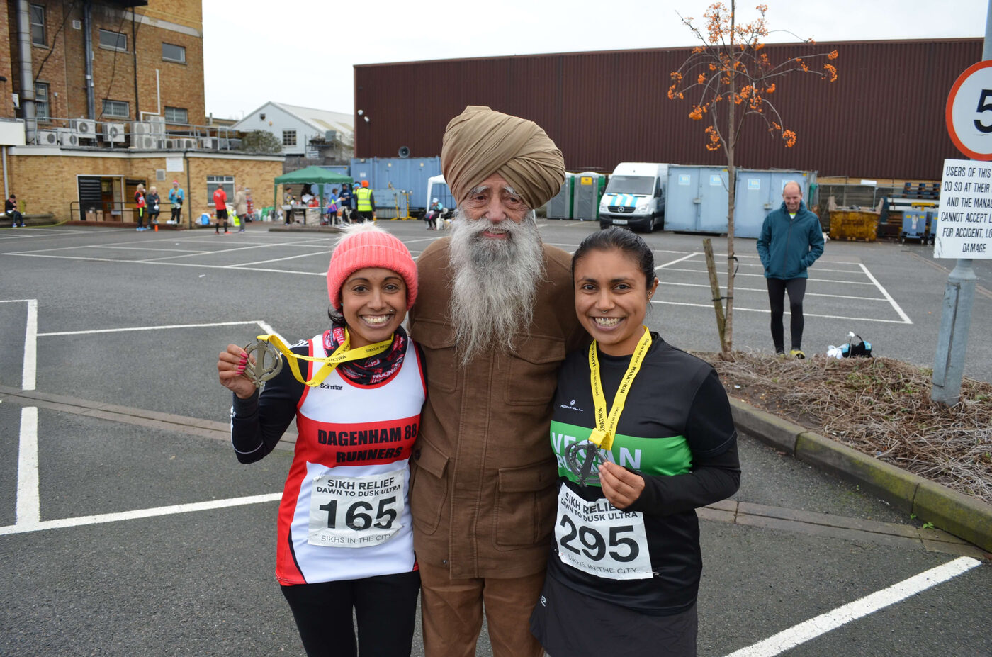 Fauja Singh with Sikhs In The City runners after a race
